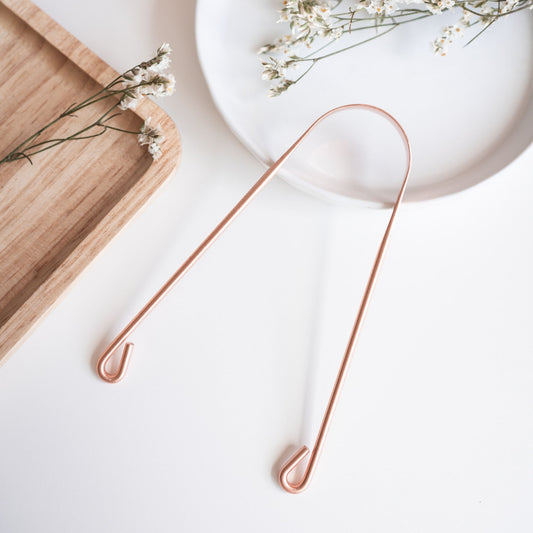 Raspador lingual cobre